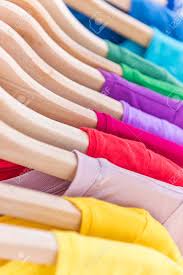 Next, decide what organizing pattern you'd like to use. Clothing Rack Hangers In Wardrobe Closet At Shopping Store Rainbow Selection Of Colorful T Shirts Tops For Spring Fashion Style Organization By Color Of Closet At Home Stock Photo Picture And Royalty Free