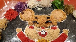 'yee sang or yu sheng' is a salad made with fresh vegetables, fruits, crackers and usually raw fish. Chynna Hilton Kuala Lumpur Cny Festive Yee Sang Youtube