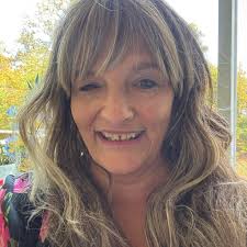 Is it normal for a broody hen to peck at her baby chicks and how to ensure  their health?