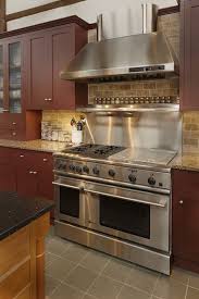 Improved Traffic Flow By Replacing A Peninsula With An Island Ceasarstone Basalt Textured Quartz Kitchen Renovation Kitchen Examples Kitchen Cabinet Styles