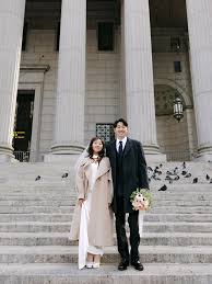 just married' moment, featuring a supporting cast of pigeons. nyc city hall  wedding photographer nyc city hall elopement photographer new york city  hall wedding nyc elopement photographer manhattan elopement photographer  nyc courthouse