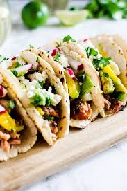 This salsa is the perfect make ahead appetizer or topping for tacos, chicken, pork or fish! Salmon Tacos With Avocado Mango Salsa A Cookie Named Desire