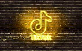 Download Wallpapers Tiktok Yellow Logo 4k Yellow Brickwall Tiktok Logo Social Networks Tiktok Neon Logo Tiktok Besthqwallpapers Com Neon Logo Neon Disney Characters Wallpaper
