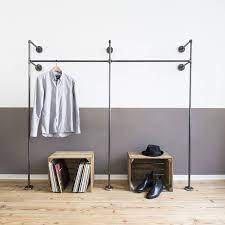 A diy pipe clothing rack gives an easy storage solution at a cheap price. Open Wardrobe Clothes Rack Clothes Stand Steel Pipe Etsy