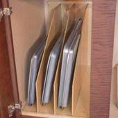 If you don't have a big enough basin, lay a large old towel on your kitchen counter and place the if the back of the cookie sheet pan is also burnt and stained, repeat all steps on the other side. Tray Organizers Divide Your Cookie Sheets Pots And Pans Muffin Pans Pizza Trays And More Kitchensource Com
