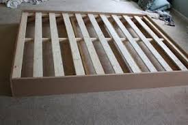 When it came time to order a i started on the two long sides of the bed by tacking on the batting which i cut to fit. Diy Upholstered Platform Bed With Curved Fabric Headboard Diy Bed Diy Bed Frame Diy Headboard Upholstered