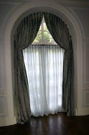 Window treatments can go a long way toward boosting your home's energy efficiency, keeping you comfortable. Everything You Need To Know About Curtain Ideas For Arched Windows Wc12uik8 Https Curtains For Arched Windows Arched Window Coverings Arched Window Treatments