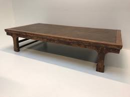 Table measures about 17 inches high by 40 inches wide and long. Vintage Indonesian Teak Rattan Coffee Table For Sale At Pamono