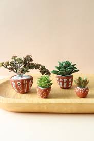 Fill a pot with cactus peat, then insert the base of your cutting. 9 Diy Planters To Perk Up Your Indoor Jungle Hello Nest