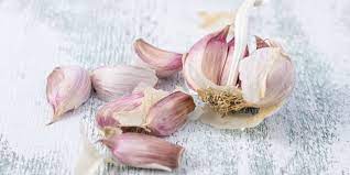 Before planting garlic, the papery skin has to be peeled off and each clove needs to be separated from the stem. Growing Your Own Garlic How To Plant Garlic