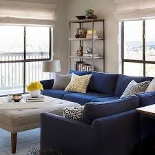 Blue Sectional With Light Gray Tufted Ottoman As Coffee Table Blue Sofa Living Blue Sofas Living Room Blue Couch Living Room