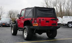 Image result for Flame Red 2009 Jeep