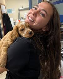 Everyone, meet Marley! 💗 This precious pup came in for her visit and  instantly won us all over. She enjoyed a cozy nap and got so much love from  our assistant Jenna—can