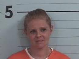 Woman charged after stealing car