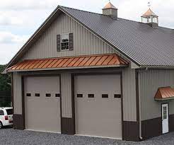 The area over doors are the critical areas where snow that falls off the roof causes the biggest problems and covering the entire eave may cost quite a lot. Metal Roofing Siding Kauffman Metals