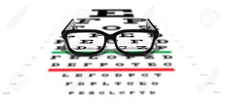 Prescription Glasses Sitting On An Eye Test Chart