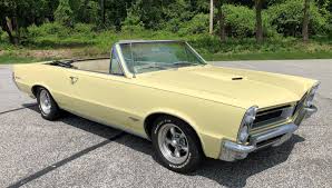 Image result for Canary Yellow 1965 AC Cars