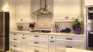 white cabinets, granite countertops