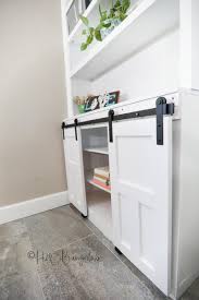They have chrome cabinet pulls that have a latch release in them. How To Update Old Built Ins Cabinets And Shelves H2obungalow
