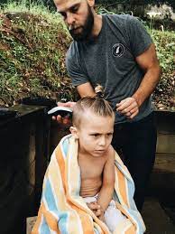 Step By Step Tutorial On How To Create The Shaved Man Bun Side Swept Hair On Your Child Toddler Boy Haircuts Boys Haircuts Toddler Boy Long Hair