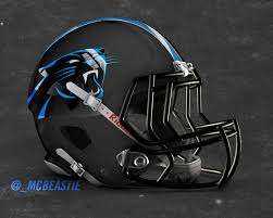 First round pick jaycee horn (8) looks over his new helmet during carolina panthers rookie camp at the atrium training facility in charlotte, nc. Mcbeastie Tweeted The Panthers A Black Matte Hydrochrome Helmet Concept They Ll Ignor Carolina Panthers Helmet Panthers Football Carolina Panthers Wallpaper