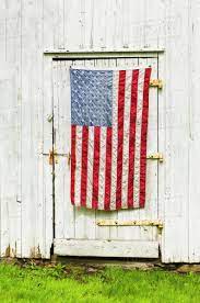/ afp photo / jim watson. American Flag Draped On Door Of Barn Stock Photo Dissolve