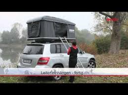 It Looks Like A Large Flat Suitcase But Open The Autohome Maggiolina Up And You Can Sleep Inside Techeblog Rooftop Tent Camping Tent Used Camping Trailers