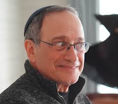 Marc's journey took him down hard roads and confusing turns. With a mic in  one hand and a prop in the other, he draws laughter