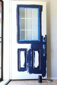Even though the paint takes a long time to dry, it is a great paint to use on fiberglass house doors. How To Paint A Front Door Without Removing It Classy Clutter