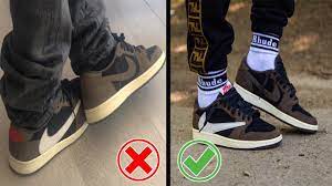 This collaborative air jordan 1 features a mix of earthy brown nubuck and white leather, and although it's not shown, a cactus jack tongue badge alongside a hidden pocket around the ankle. Slava Vjestina Sjeverni Jordan Low Travis Scott Goldstandardsounds Com
