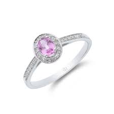 Whether you are looking a classic solitaire, a diamond halo design, or a more modern bezel set piece, you'll find the perfect sapphire engagement ring in our collection. 18ct White Gold Oval Cut Pink Sapphire 0 53ct Diamond Halo Ring
