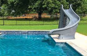 Locating your pool just outside the door is advantageous for families with older children. Free Standing Swimming Pool Slides 5 Key Options When Picking A Model