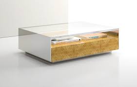 The espresso color of the wood nicely matches the gray finish of the metal frame, giving the piece an elegant touch. Exqusite Square Wood Metal Glass Coffee Table Ambience Dore