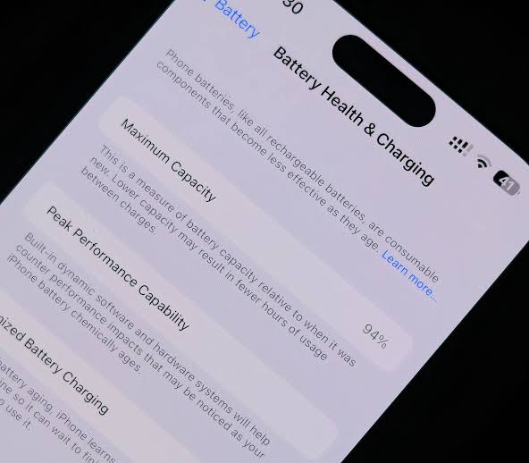 Check your maximum capacity to see if the battery needs replacing., AI generated