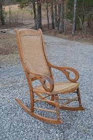 just got a rocking chair like this yet it was painted black and needs recaning i can t wait to ref antique rocking chairs rocking chair antique dining chairs