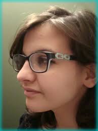 Truffles the optician's office mascot wears glasses