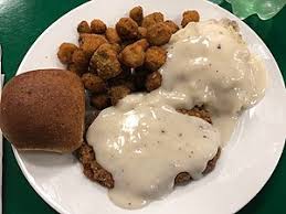Gently place your chicken fried steaks into the skillet and lightly fry for about 2 to 4 minutes a side or until golden brown. Chicken Fried Steak Wikipedia