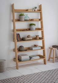 This Beautiful Raw Oak Ladder Bookshelf Provides A Practical Solution To All Your Storage And Shelving Need Oak Ladder Shelf Ladder Shelf Wooden Shelving Units