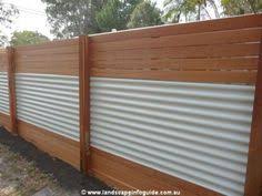 To create a truly unique fence design with lasting durability… more homeowners are using metal fence posts and frame kits. Horizontal Wood Fence Google Search Backyard Fences Backyard Corrugated Metal Fence