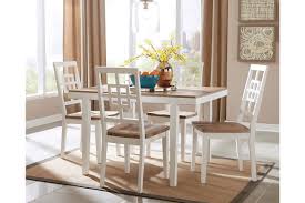 You are finally springing for that new dining room set you've been longing for, but with so how big is your dining room space? Brovada Dining Table And Chairs Set Of 5 Ashley Furniture Homestore