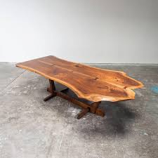 George Nakashima Conoid Dining Table And Ten Conoid Chairs 2 Live Edge Wood Table Antique Dining Room Sets Rustic Wood Floating Shelves