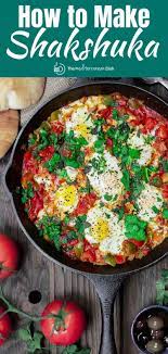 Hands Down The Best Shakshauka Recipe You Ll Try Gently Poached Eggs In A Simmering Flavor Packed Chunky Tomat Shakshuka Recipes Shakshuka Mediterranean Dish
