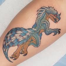 The first pattern depicts a fish hook with a turquoise feather and another design displays a hook with an orange feather and the lettering: Monster Hunter Tattoo I Got Monday Monsterhunter