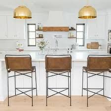 Maybe you would like to learn more about one of these? Molded Brown Leather Barstools At White Kitchen Island Transitional Kitchen Transitional Kitchen Brown Leather Bar Stools White Kitchen Island