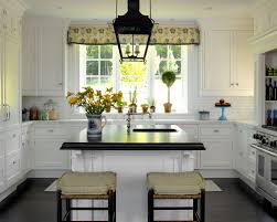 Overall, though, the look is more classic than colonial. Colonial Style Kitchen With White Cabinetry Blue Yellow Accents Scott Sanders Colonial Home Decor Kitchen Remodel Diy Kitchen Countertops