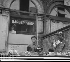 jewish street vendor 犹太人的小卖部 life magazine black and white photography barber shop