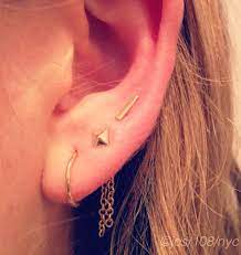 A Delicate Piercing Craze Sweeps The Fashion Set Fashion Set Piercing Cute Ear Piercings