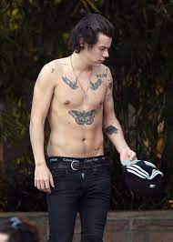 Even simple tattoo designs in a single color without shading add a touch of the modern to your ensemble. Harry Styles Tattoos And Meanings Complete List Of One Direction Star S Body Art