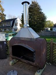Heating Oil Tank Repurposed Into An Outdoor Fireplace Outdoor Fireplace Outdoor Fireplace Designs Outdoor Gas Fireplace