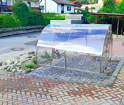 Fahrradunterstand Auf Eine Pflasterflache Aus Kleinstein Granit Und Angrenzendem Steingarten Granitpflaster Landschaftsgartner Garten Landschaftsbau